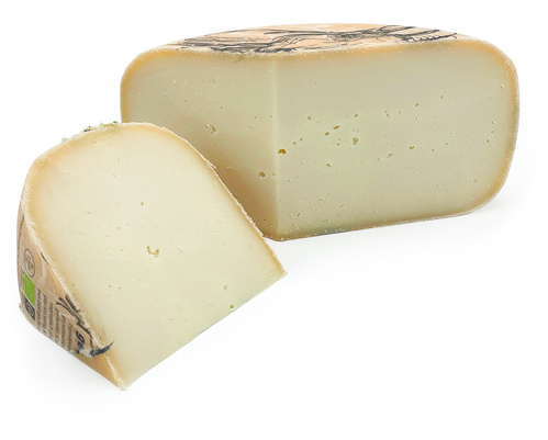 KI generiert: Ein Laib Käse mit einem abgeschnittenen Stück, weißlich mit leichter Rinde.