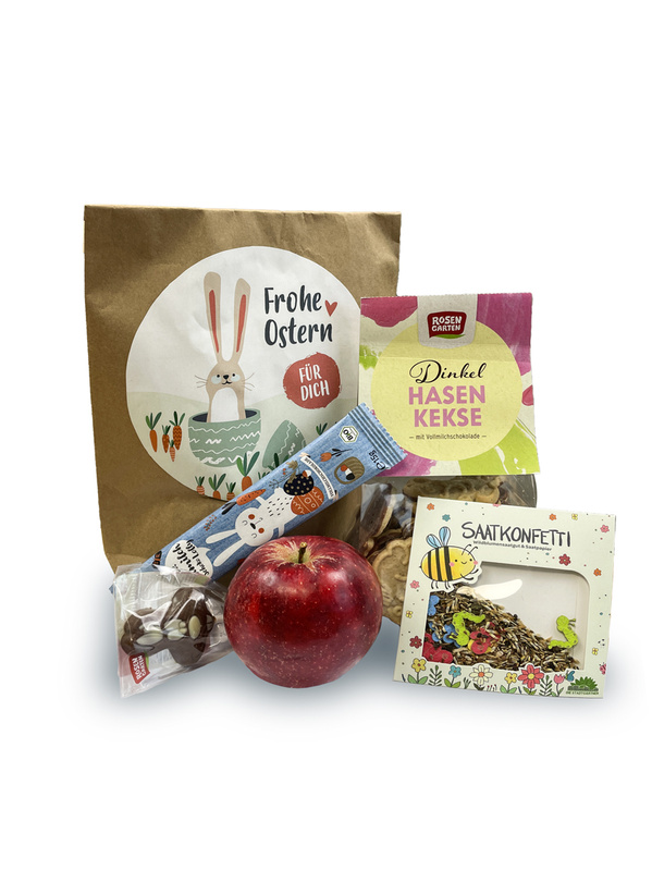 KI generiert: Osterdekoration mit Apfel, Keksen und Saatkonfetti. Text: "Frohe Ostern", "Dinkel Hasen Kekse", "Saatkonfetti".