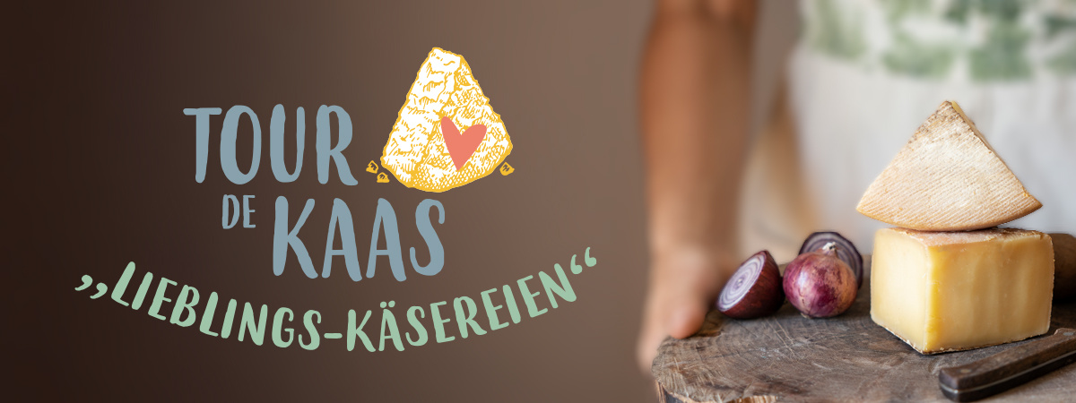 KI generiert: Ein Käsebrett mit Käse und Trauben. Text: "Tour de Kaas Lieblings-Käsereien".