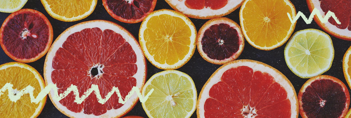 Augeschnittene Clementinen, Orangen, Blutorangen, Zitronen