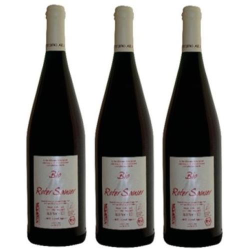 drei Flaschen roter Sauser